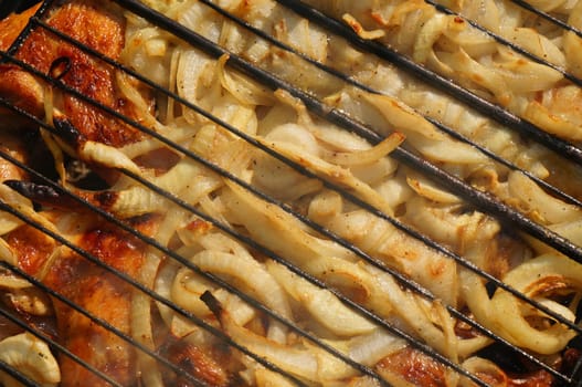 Smoked onion rings on the grill diagonally