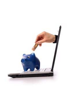Notebook with a piggy bank, saving money concept