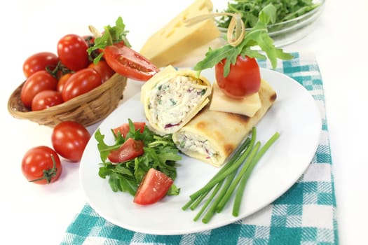 a crepe filled with cheese,radishes and chigs