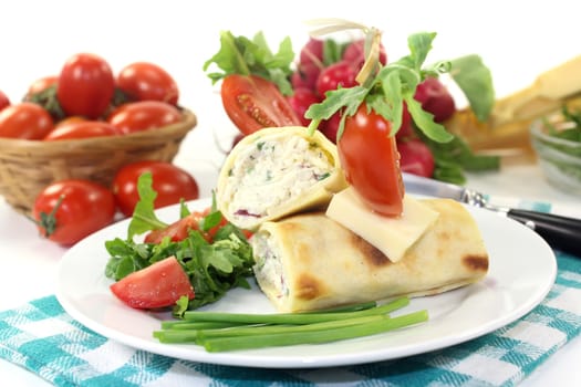 a crepe filled with cheese,radishes and chigs