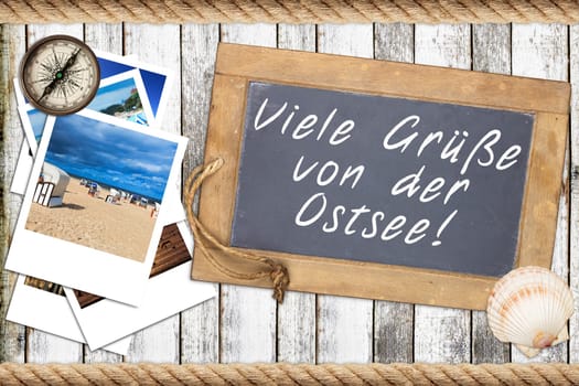 Maritime holiday greetings from the Baltic Sea on a blackboard with photos