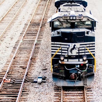 slow moving Coal wagons on railway tracks