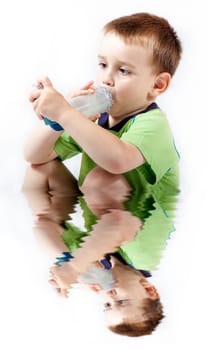 Little boy using inhaler for asthma isolated on white background with reflection on water