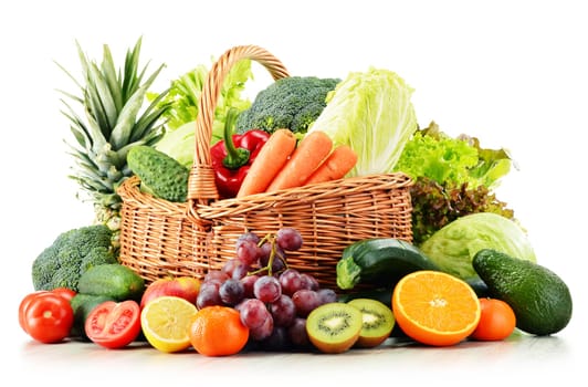 Wicker basket with groceries isolated on white background
