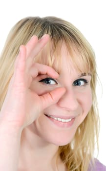 young woman shows magnifying glass