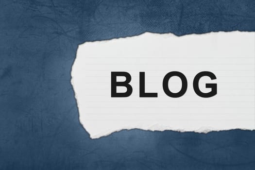 blog with white paper tears on blue texture