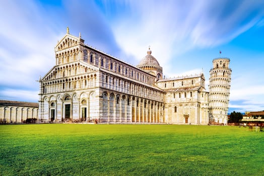 Piazza dei Miracoli complex with the leaning tower of Pisa in front, Italy