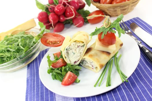 a crepe filled with cheese,radishes and chigs