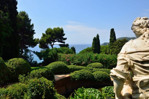 View of a beautiful botanical garden on the coast of mediterranean sea