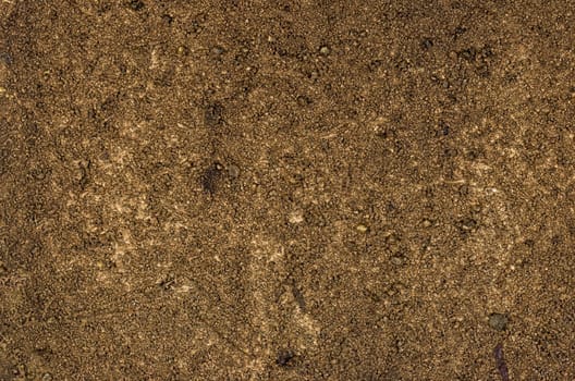 Detailed view of a canvas with acrylic paint and sand