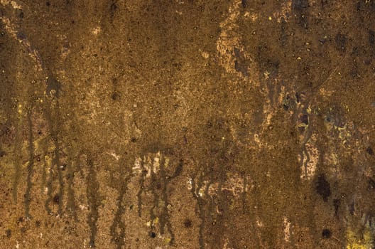 Detailed view of a canvas with acrylic paint and sand