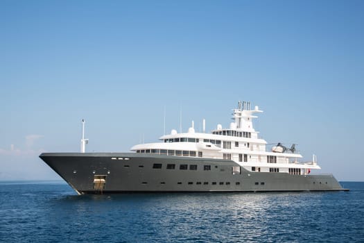 Gigantic big and large luxury mega or super motor yacht. Investment for millionaires or billionaires.