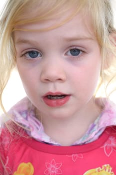 A studio shot of a young female child
