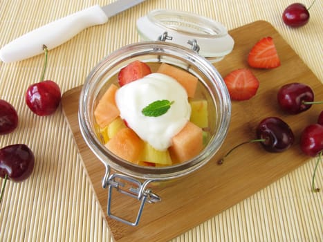 Fresh fruit with yoghurt in the glass