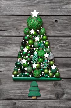 Green traditional christmas decoration with wood