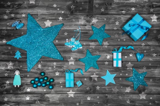 Turquoise advent decoration on wooden shabby chic background.
