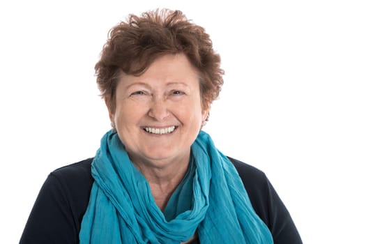 Portrait of a satisfied happy older woman isolated over white.
