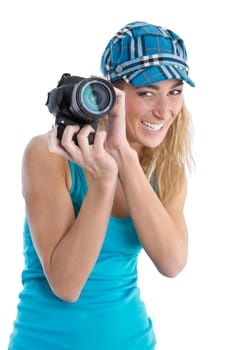 Professional female stock photographer isolated on white holding her camera in hands.