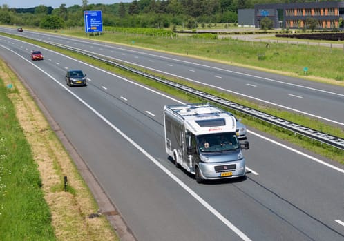highway with home going travelers in a camper