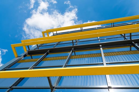 exterior of a modern office building with yellow decorations