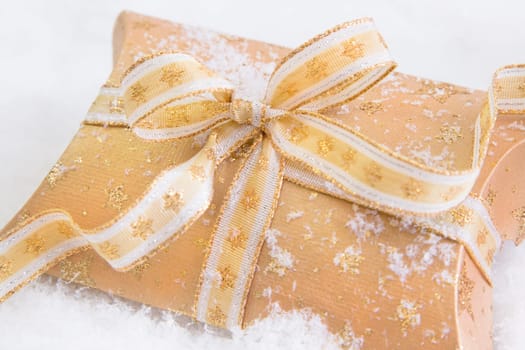 Close up of golden present box for christmas