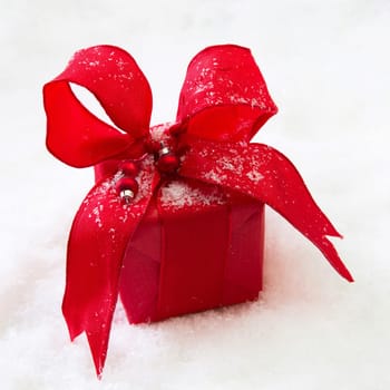 Red isolated gift or present with a ribbon for christmas