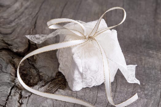 Close up of present box on wooden background for christmas..