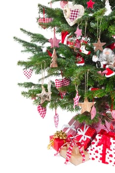Isolated christmas tree in red decoration with gift boxes and presents
