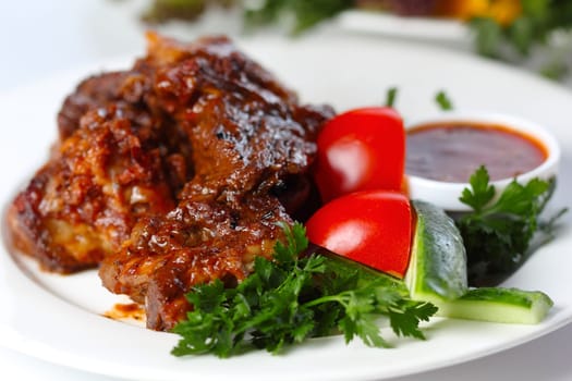 Delicious beef goulash with greens and vegetables (closeup, selective focus)