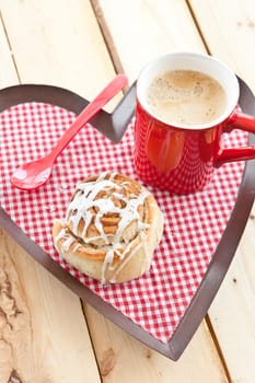 Fresh Swedish cinnamon snail and coffee for a winter coffee break