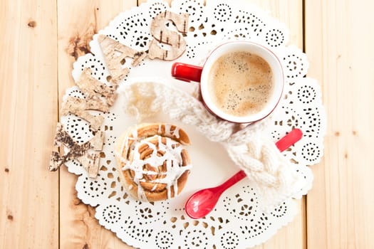 Fresh Swedish cinnamon snail and coffee for a winter coffee break