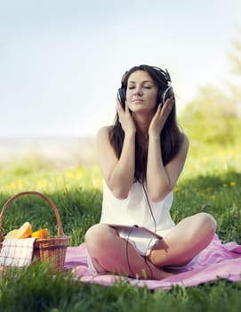 Young woman listening to music