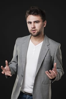 Attractive man explains something