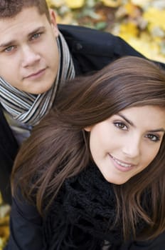 Young couple looking at camera