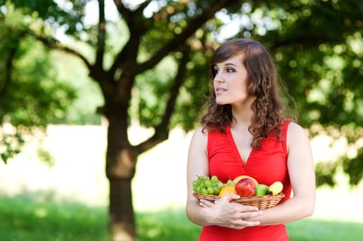 Young woman in orchard