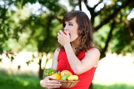Young woman in orchard