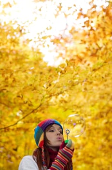 Blowing bubbles during autumn