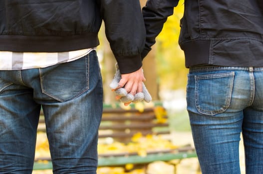 Holding hands in the park