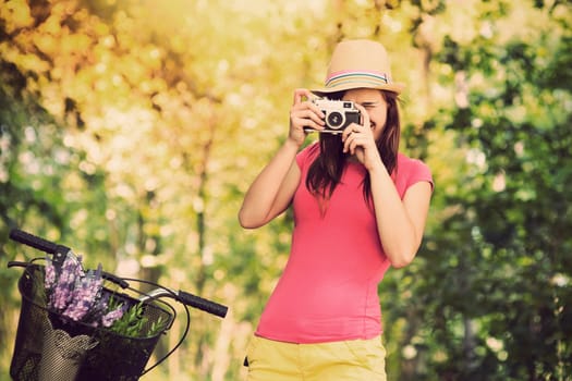 Retro photographer using old camera