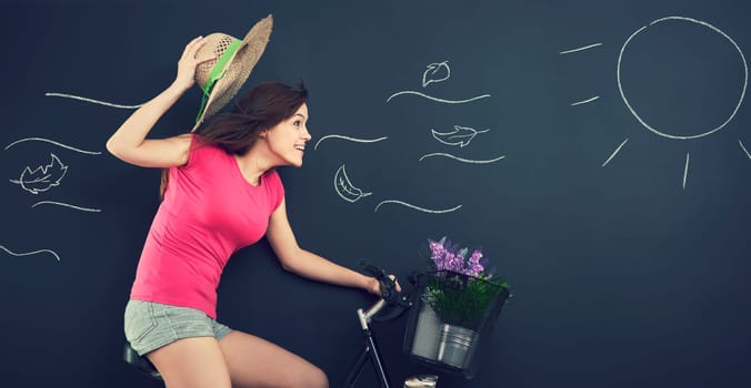 Woman with hat during cycling