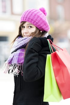 Young woman with shopping bags