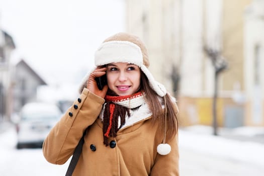 Young woman talking on the phone