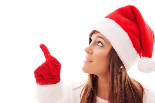 Christmas woman pointing at copy space