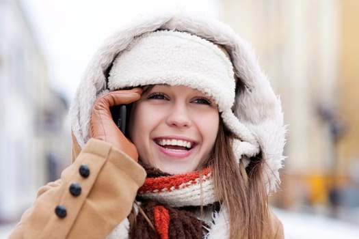 Young woman talking on the phone