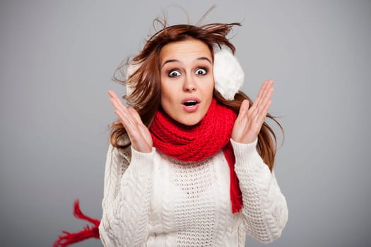 Terrified young woman in big storm