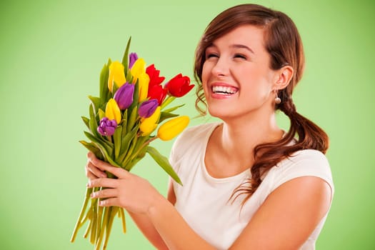 Laughing woman with tulips
