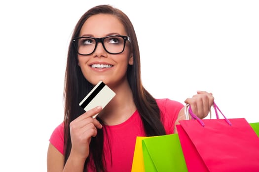 Young woman planning shopping list