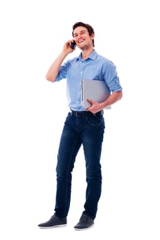 Happy man with laptop talking on the mobile phone