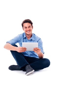 Sitting man using a digital tablet