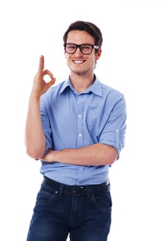 Young happy man showing ok sign